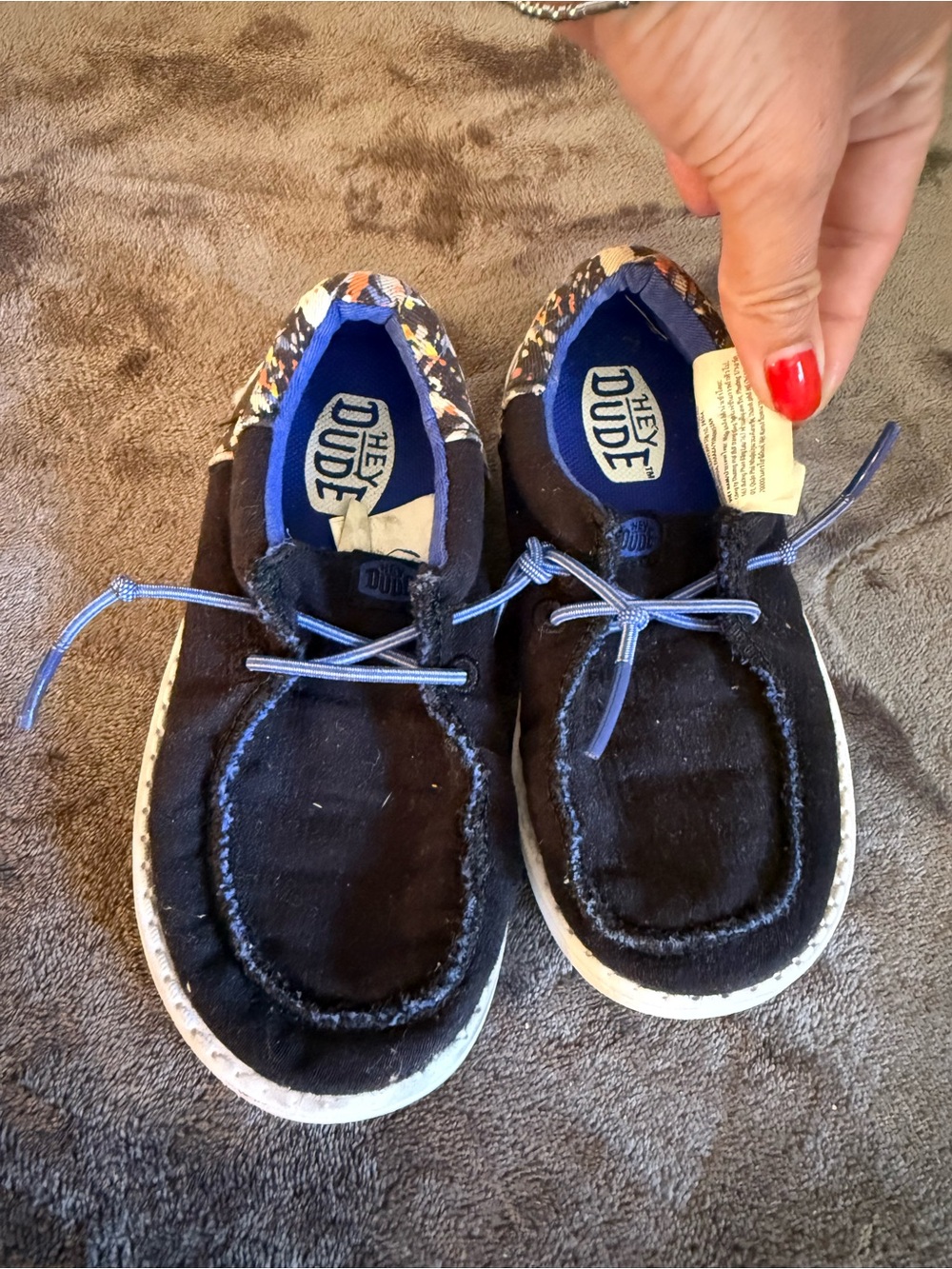 Hey Dude Kids Black Slip-On Sneakers with Blue Accents and Patterned Collar